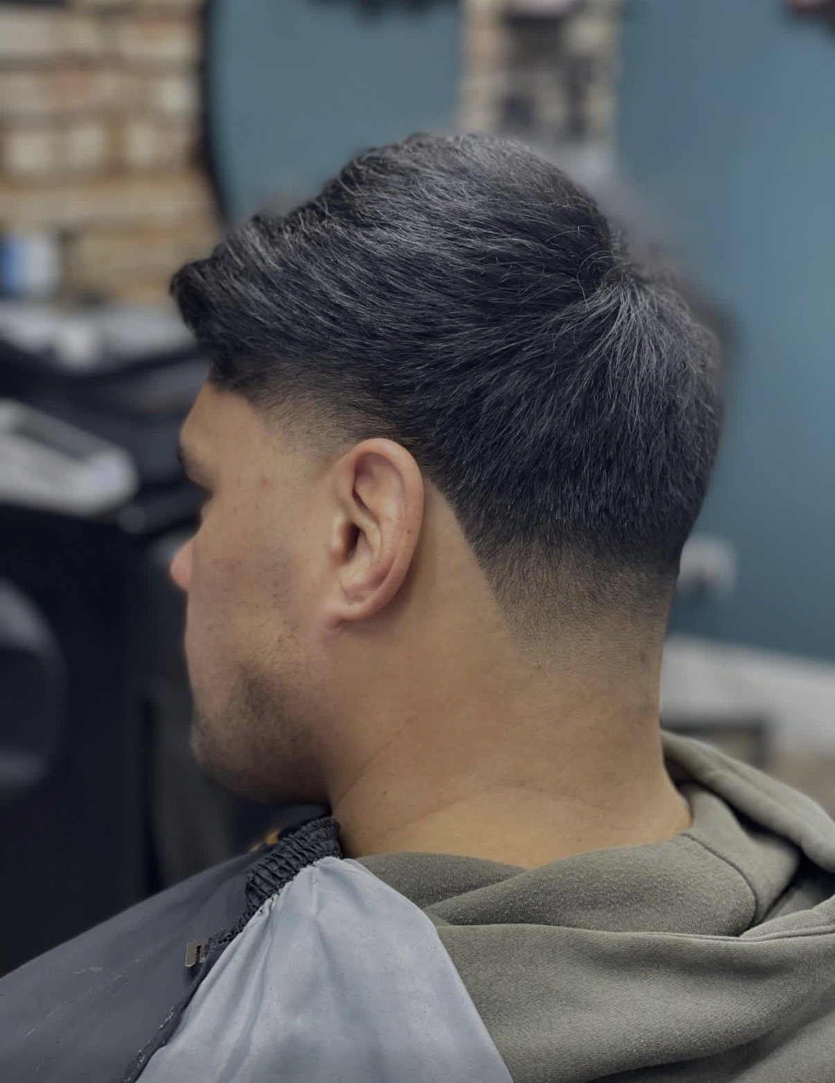 Longer scissor cut top with a tapered back