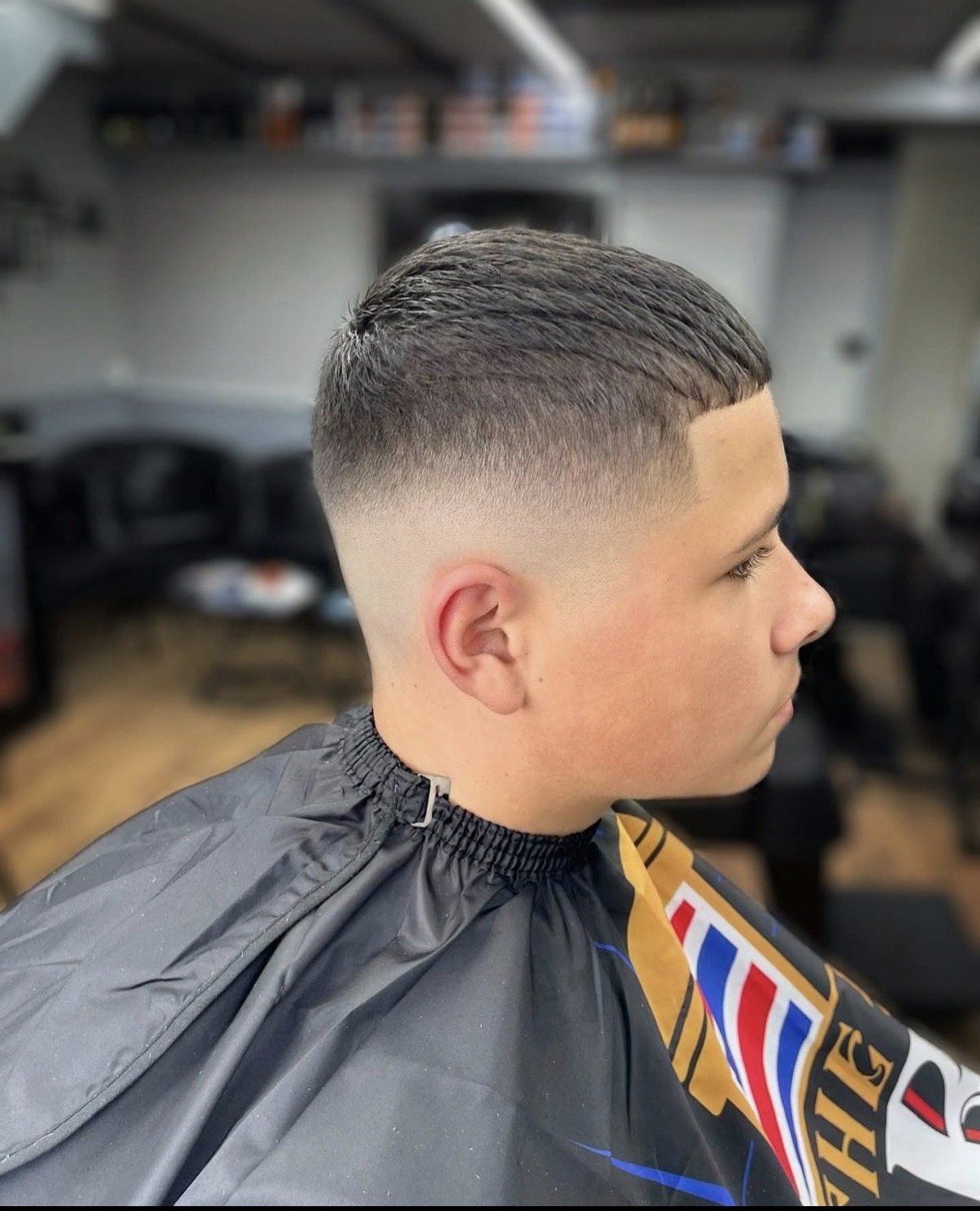 Short side part with a blended skin fade